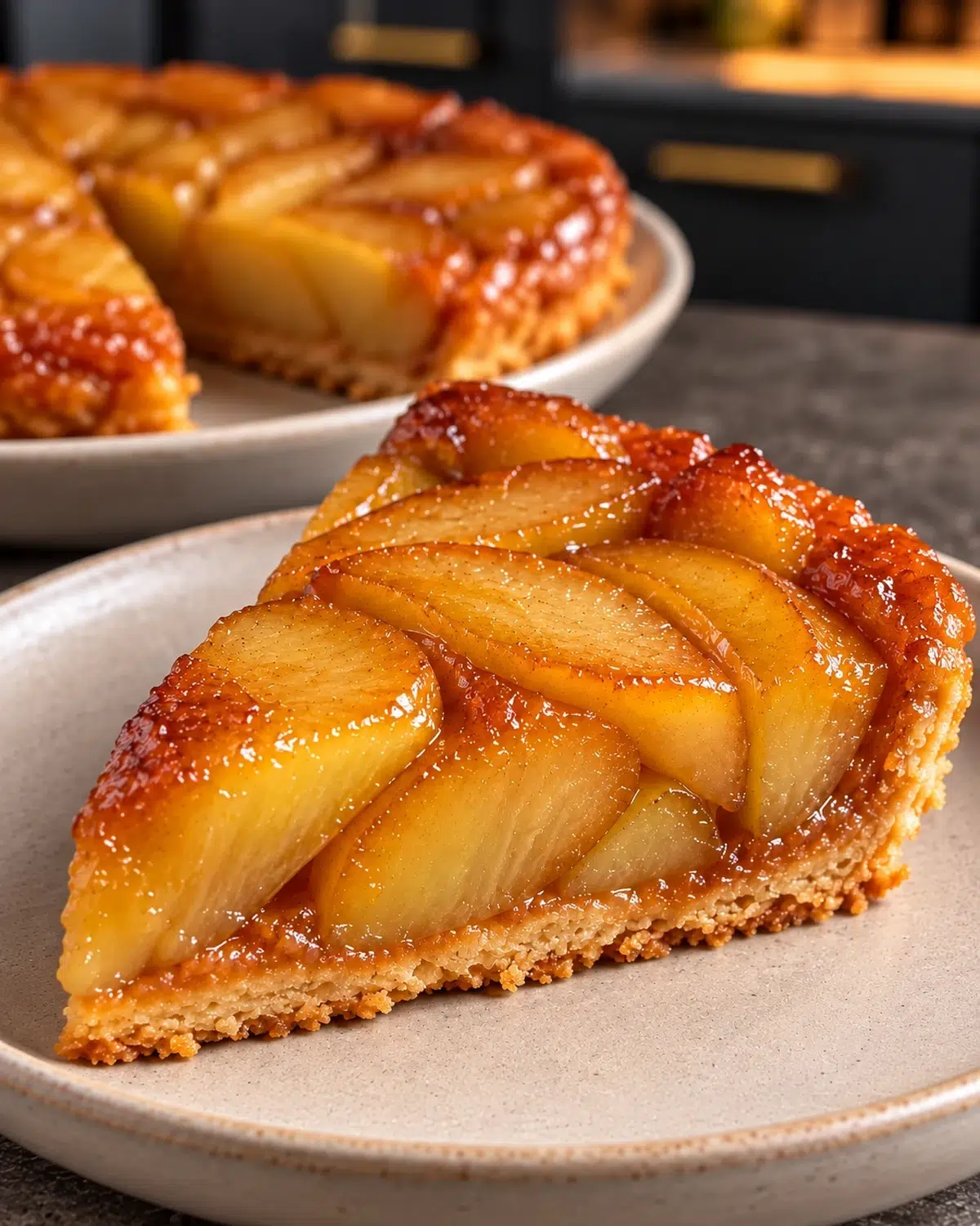 Sugar-free apple tarte tatin with glossy caramelized apples on a serving plate