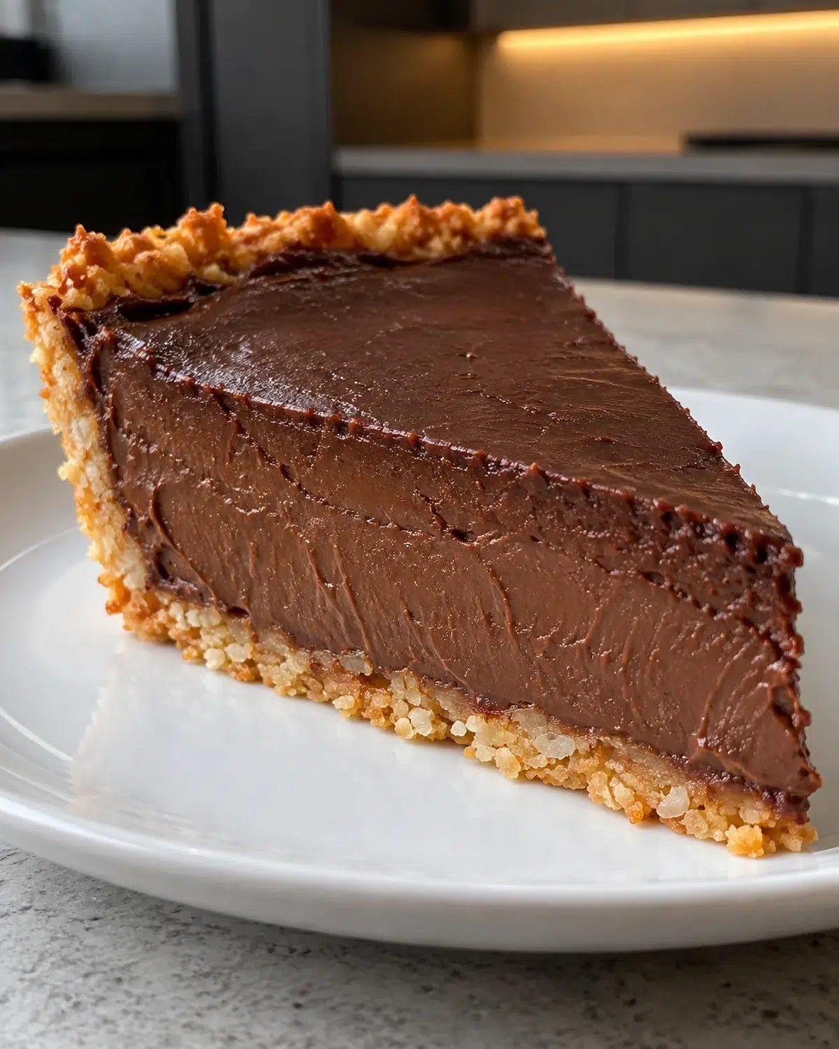 Sugar-free chocolate pie slice with thick custard filling and thin crust